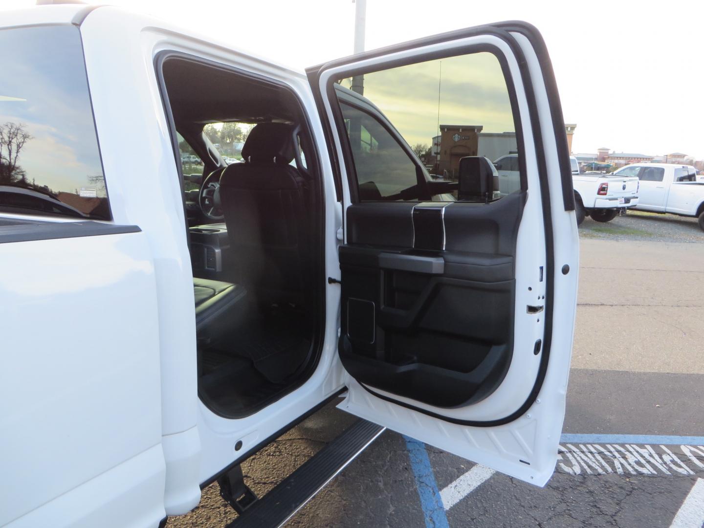 2020 White /BLACK Ford F-450 SD PlatinumCrew Cab DRW 4WD (1FT8W4DT4LE) with an 6.7L V8 OHV 16V DIESEL engine, 6A transmission, located at 2630 Grass Valley Highway, Auburn, CA, 95603, (530) 508-5100, 38.937893, -121.095482 - Must see F450 with a tool box refueling station, window tint, and a center console vault. - Photo#52